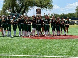 Calvary Softball team celebrates 2024 State Championship victory with trophy