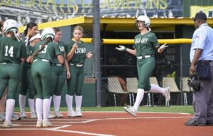 Calvary Softball team member trots back to team